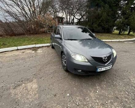 Серый Мазда 3, объемом двигателя 2 л и пробегом 302 тыс. км за 4200 $, фото 1 на Automoto.ua