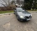 Серый Мазда 3, объемом двигателя 2 л и пробегом 302 тыс. км за 4200 $, фото 1 на Automoto.ua