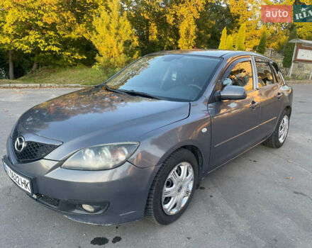 Серый Мазда 3, объемом двигателя 2 л и пробегом 300 тыс. км за 6500 $, фото 2 на Automoto.ua