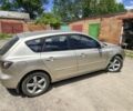 Сірий Мазда 3, об'ємом двигуна 1.6 л та пробігом 249 тис. км за 4513 $, фото 2 на Automoto.ua