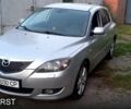 Серый Мазда 3, объемом двигателя 2 л и пробегом 230 тыс. км за 3100 $, фото 1 на Automoto.ua