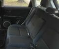Серый Мазда 3, объемом двигателя 1.6 л и пробегом 250 тыс. км за 1950 $, фото 4 на Automoto.ua