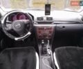 Сірий Мазда 3, об'ємом двигуна 1.56 л та пробігом 246 тис. км за 4200 $, фото 9 на Automoto.ua