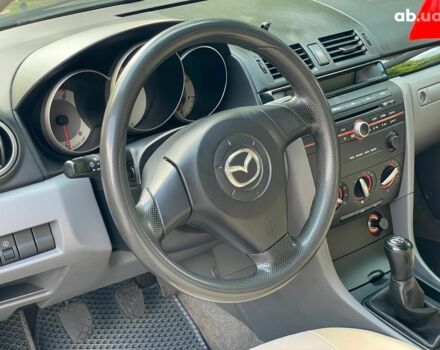 Сірий Мазда 3, об'ємом двигуна 1.4 л та пробігом 305 тис. км за 5340 $, фото 12 на Automoto.ua