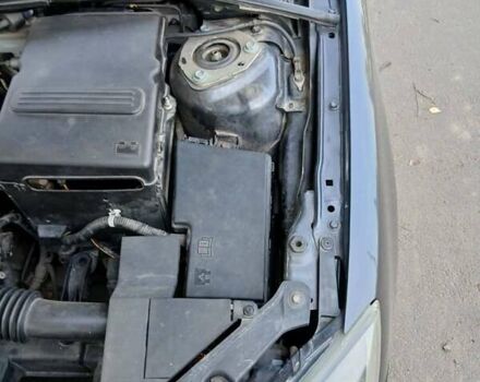 Сірий Мазда 3, об'ємом двигуна 1.6 л та пробігом 255 тис. км за 4800 $, фото 4 на Automoto.ua