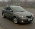 Серый Мазда 3, объемом двигателя 1.6 л и пробегом 254 тыс. км за 5500 $, фото 1 на Automoto.ua