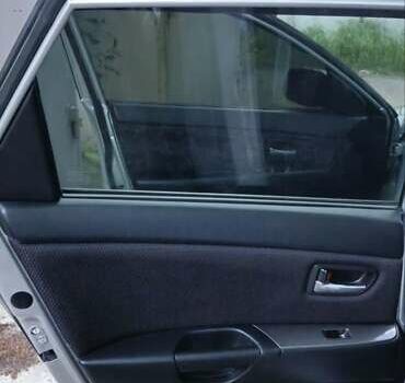 Серый Мазда 3, объемом двигателя 1.6 л и пробегом 297 тыс. км за 5600 $, фото 10 на Automoto.ua