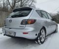 Серый Мазда 3, объемом двигателя 1.6 л и пробегом 228 тыс. км за 4499 $, фото 1 на Automoto.ua