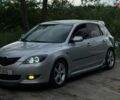 Серый Мазда 3, объемом двигателя 1.6 л и пробегом 230 тыс. км за 4100 $, фото 1 на Automoto.ua
