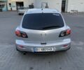 Сірий Мазда 3, об'ємом двигуна 1.6 л та пробігом 259 тис. км за 4497 $, фото 2 на Automoto.ua