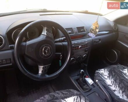 Серый Мазда 3, объемом двигателя 1.56 л и пробегом 174 тыс. км за 6000 $, фото 7 на Automoto.ua