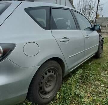 Серый Мазда 3, объемом двигателя 1.6 л и пробегом 370 тыс. км за 2200 $, фото 2 на Automoto.ua