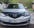 Серый Мазда 3, объемом двигателя 1.6 л и пробегом 297 тыс. км за 5600 $, фото 1 на Automoto.ua
