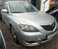 Серый Мазда 3, объемом двигателя 1.6 л и пробегом 200 тыс. км за 1750 $, фото 1 на Automoto.ua