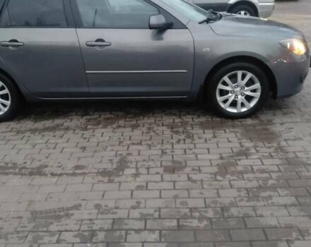 Серый Мазда 3, объемом двигателя 1.6 л и пробегом 128 тыс. км за 4850 $, фото 3 на Automoto.ua