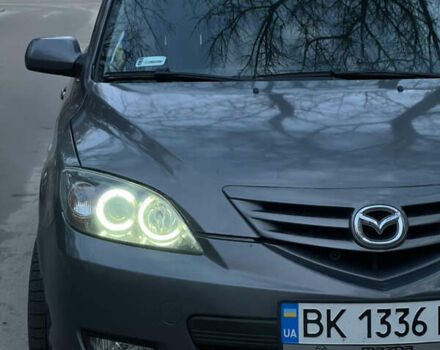 Серый Мазда 3, объемом двигателя 2 л и пробегом 298 тыс. км за 5600 $, фото 5 на Automoto.ua