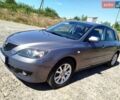 Серый Мазда 3, объемом двигателя 1.6 л и пробегом 269 тыс. км за 4999 $, фото 1 на Automoto.ua