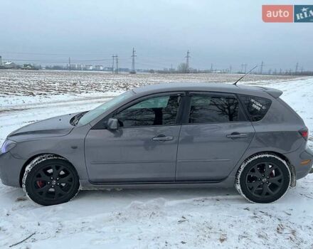 Серый Мазда 3, объемом двигателя 1.6 л и пробегом 320 тыс. км за 7999 $, фото 4 на Automoto.ua