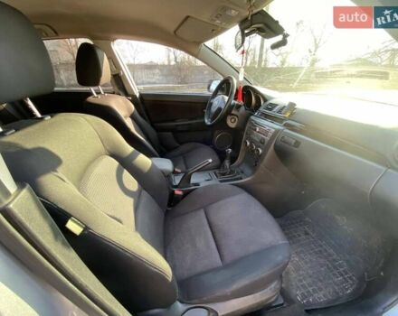 Серый Мазда 3, объемом двигателя 2 л и пробегом 301 тыс. км за 5400 $, фото 13 на Automoto.ua