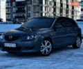 Сірий Мазда 3, об'ємом двигуна 1.6 л та пробігом 263 тис. км за 4650 $, фото 4 на Automoto.ua