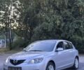 Серый Мазда 3, объемом двигателя 2 л и пробегом 260 тыс. км за 2700 $, фото 1 на Automoto.ua
