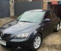 Серый Мазда 3, объемом двигателя 1.6 л и пробегом 153 тыс. км за 6000 $, фото 1 на Automoto.ua