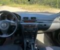 Серый Мазда 3, объемом двигателя 1.6 л и пробегом 228 тыс. км за 2696 $, фото 3 на Automoto.ua