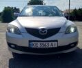 Серый Мазда 3, объемом двигателя 1.6 л и пробегом 130 тыс. км за 4100 $, фото 1 на Automoto.ua