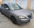 Серый Мазда 3, объемом двигателя 1.6 л и пробегом 177 тыс. км за 5200 $, фото 1 на Automoto.ua