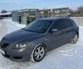Сірий Мазда 3, об'ємом двигуна 1.6 л та пробігом 257 тис. км за 4100 $, фото 1 на Automoto.ua