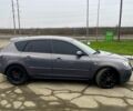 Серый Мазда 3, объемом двигателя 1.6 л и пробегом 290 тыс. км за 4999 $, фото 3 на Automoto.ua