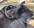 Серый Мазда 3, объемом двигателя 2 л и пробегом 301 тыс. км за 5400 $, фото 9 на Automoto.ua