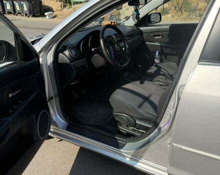Сірий Мазда 3, об'ємом двигуна 1.56 л та пробігом 223 тис. км за 4999 $, фото 3 на Automoto.ua