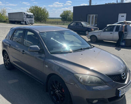 Серый Мазда 3, объемом двигателя 1.6 л и пробегом 290 тыс. км за 5200 $, фото 2 на Automoto.ua