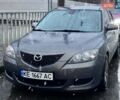 Серый Мазда 3, объемом двигателя 1.56 л и пробегом 299 тыс. км за 4500 $, фото 1 на Automoto.ua