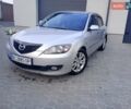 Серый Мазда 3, объемом двигателя 1.6 л и пробегом 229 тыс. км за 5200 $, фото 1 на Automoto.ua