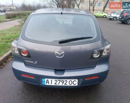 Серый Мазда 3, объемом двигателя 1.56 л и пробегом 269 тыс. км за 5200 $, фото 2 на Automoto.ua