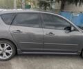 Серый Мазда 3, объемом двигателя 2 л и пробегом 258 тыс. км за 4600 $, фото 1 на Automoto.ua
