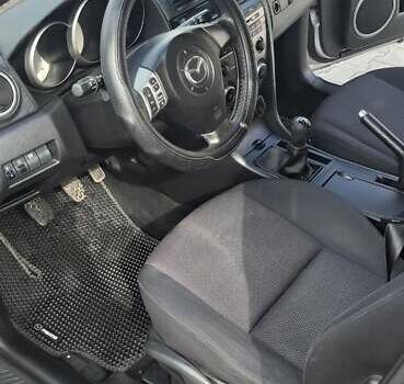 Серый Мазда 3, объемом двигателя 1.6 л и пробегом 226 тыс. км за 4100 $, фото 5 на Automoto.ua