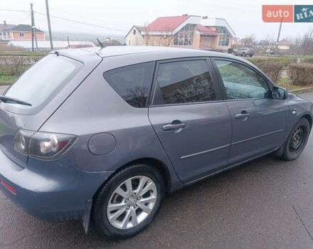 Серый Мазда 3, объемом двигателя 1.56 л и пробегом 269 тыс. км за 5200 $, фото 6 на Automoto.ua