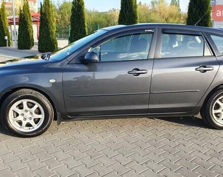 Серый Мазда 3, объемом двигателя 1.56 л и пробегом 198 тыс. км за 5700 $, фото 2 на Automoto.ua