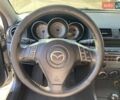 Серый Мазда 3, объемом двигателя 2 л и пробегом 301 тыс. км за 5400 $, фото 15 на Automoto.ua
