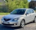 Серый Мазда 3, объемом двигателя 2 л и пробегом 248 тыс. км за 2000 $, фото 1 на Automoto.ua