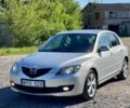 Серый Мазда 3, объемом двигателя 2 л и пробегом 248 тыс. км за 2000 $, фото 1 на Automoto.ua