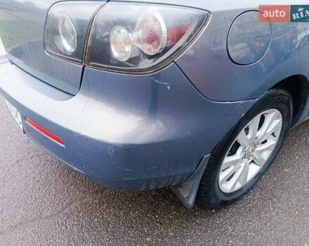Серый Мазда 3, объемом двигателя 1.56 л и пробегом 269 тыс. км за 5200 $, фото 25 на Automoto.ua