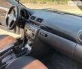 Сірий Мазда 3, об'ємом двигуна 1.6 л та пробігом 253 тис. км за 5499 $, фото 7 на Automoto.ua