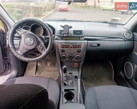 Серый Мазда 3, объемом двигателя 1.56 л и пробегом 269 тыс. км за 5200 $, фото 19 на Automoto.ua