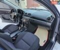 Сірий Мазда 3, об'ємом двигуна 1.6 л та пробігом 289 тис. км за 5300 $, фото 79 на Automoto.ua