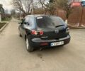 Серый Мазда 3, объемом двигателя 1.6 л и пробегом 165 тыс. км за 5300 $, фото 6 на Automoto.ua