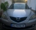Серый Мазда 3, объемом двигателя 2 л и пробегом 177 тыс. км за 6000 $, фото 1 на Automoto.ua